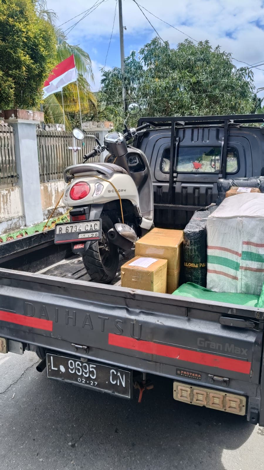 Pengangkutan kendaraan bermotor dan kargo reguler via darat